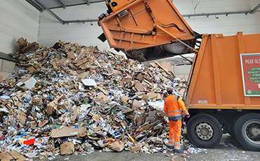 How is waste sorted at a waste disposal plant?